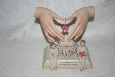 Touching Hearts Ornament In Safe Hands by Regency