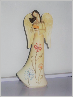 Flower Angel with floral design Holding A Butterfly