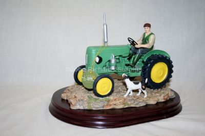 Welcome home Green Tractor on Wooden Plinth